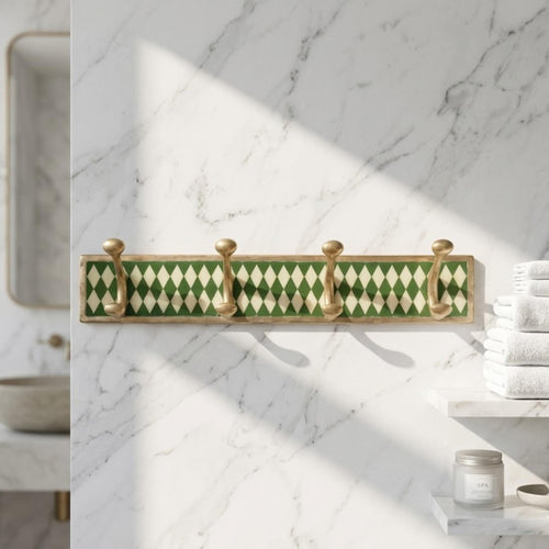 The Zellige solid brass hook rack with green resin inlay, front view